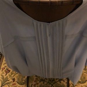 blouse that hides everything. Very slimming.